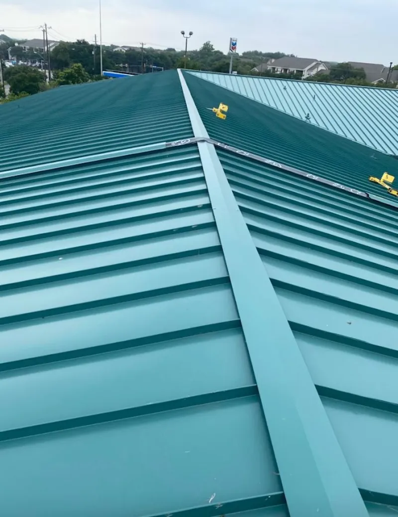 Green commercial metal roof ridge and valley for Metal Roof Repair in Hannibal