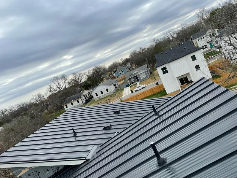 Standing seam metal roof panels with vents for Skylight Repair in Hannibal